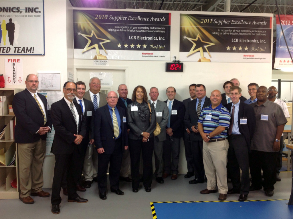 From left: Dave Freeman, Eastern Regional Sales Manager, LCR Embedded Systems; Shmuel Yankelewitz, Chief Operating Officer, LCR Embedded Systems; Dennis M. Davin, Secretary, PA Department of Community and Economic Development; David Joseph, Director of Aegis Programs Raytheon; Nissen Isakov, President, LCR Embedded Systems; Kevin Kenney, NAVSEA Program Executive Office, Integrated Warfare Systems; Suzanne Holloman, Dean of Workforce Development and Continuing Education, Montgomery County Community College; Tom Venditti, Statewide Director, WEDnetPA; Kurt Imhof, Regional Representative, Senator Robert Casey; Philip Innamorato, Field Representative, Senator Patrick Toomey; John Ennis, Above Water Sensors Lead, Raytheon; Peter George, New England Sales Representative, LCR Embedded Systems; Mike Shorr, PA Department of Community and Economic Development; Steve Teahan, Aegis Quality Program Lead, Raytheon; John Long, VP Integrated Systems, LCR Embedded Systems; Rick Nace, Senior Staff Engineer, LCR Embedded Systems; Alvin Edwards, Wire Wrap Supervisor, LCR Embedded Systems; Markeith Carroll, Aluminum Backplane/Header Products Supervisor, LCR Embedded Systems